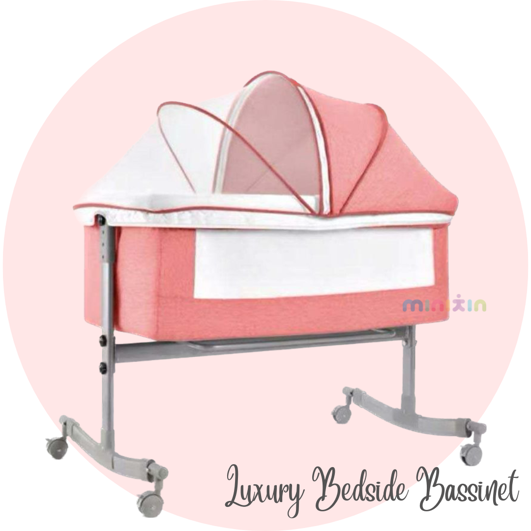 Pink baby outlet bassinet